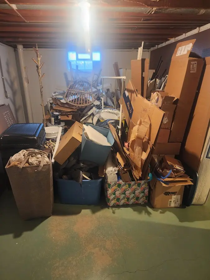 Roll-off dumpster container at job site for 15 Yard Dumpster Rental in Upper